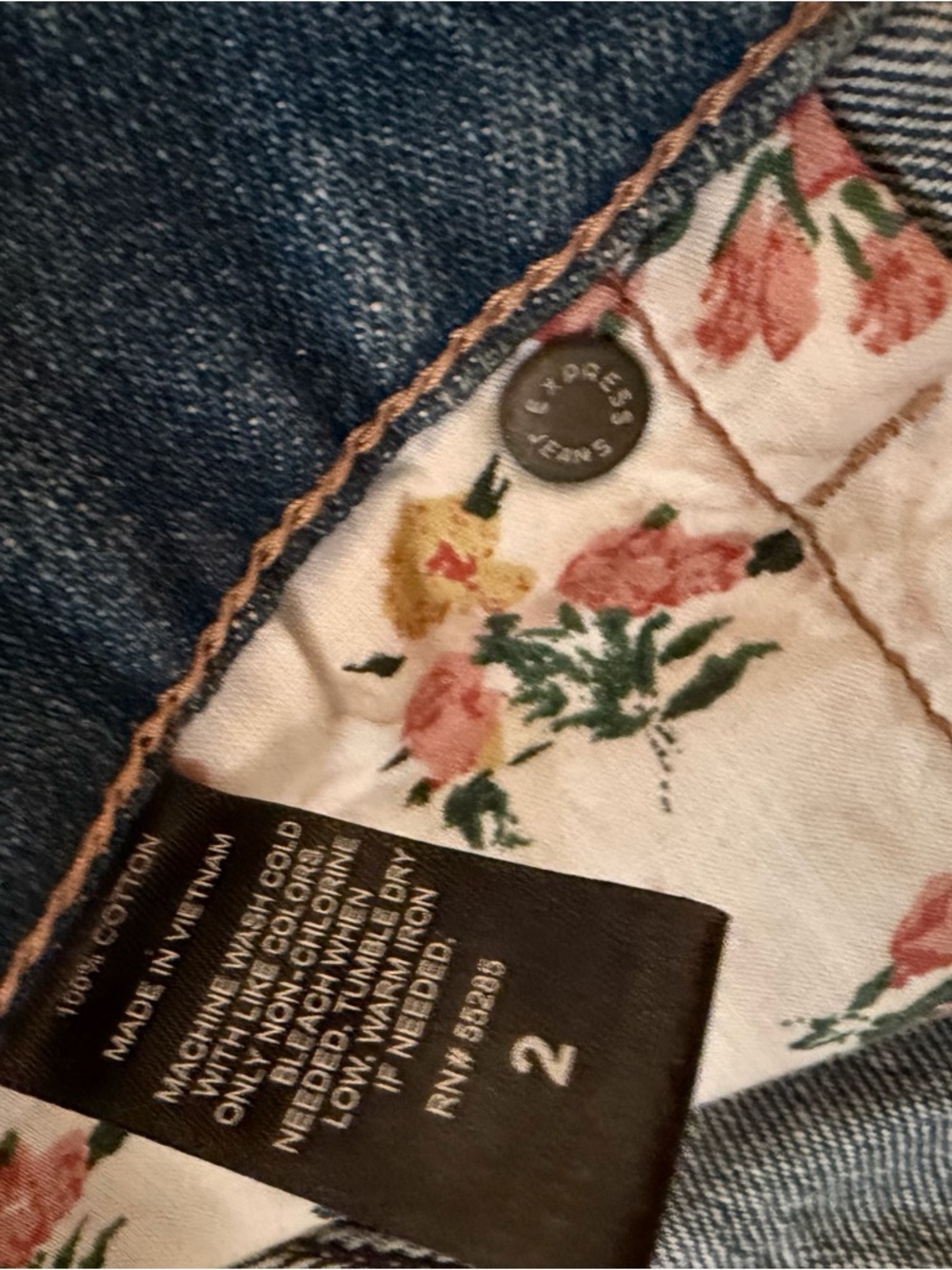 Express Distressed Denim Shorts with Floral Peek in Blue - Picture 4 of 4